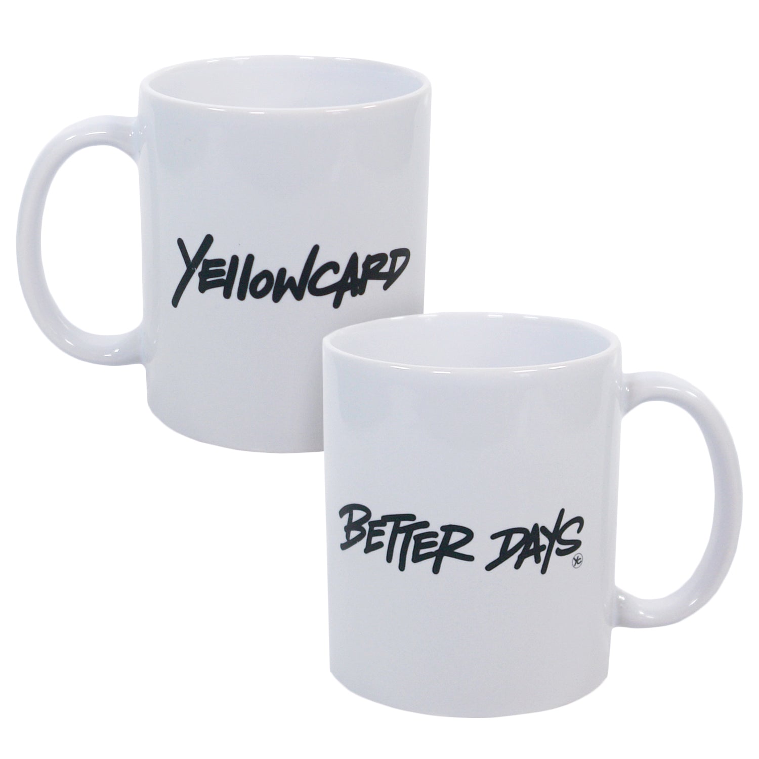 Two white ceramic mugs: one with "Yellowcard" in black script, the other with "Better Days" in black script. Both mugs, sold under the product name "Better Days - Mug," have handles on the right side.