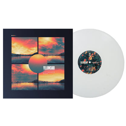 A Childhood Eyes - White - Vinyl LP lies next to its cover, which displays a stylized sunset over water divided into four panels with a large orange sun and the text Yellowcard and Childhood Eyes on the front.