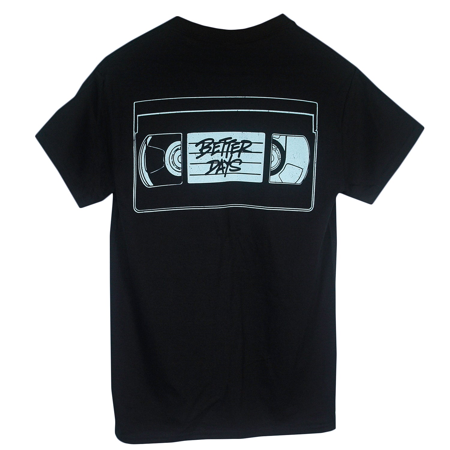 The Logo VHS - Black T-Shirt is a black Gildan Heavy Cotton tee with a large graphic of a VHS tape on the back, featuring "BETTER DAYS" in stylized lettering across the tape’s label area.
