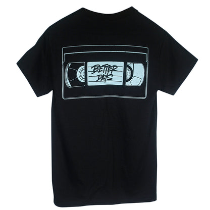 The Logo VHS - Black T-Shirt is a black Gildan Heavy Cotton tee with a large graphic of a VHS tape on the back, featuring "BETTER DAYS" in stylized lettering across the tape’s label area.