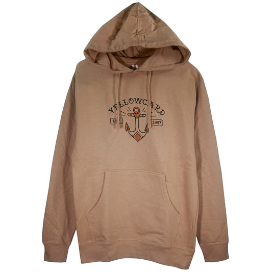 The Tattoo Ship - Sandstone Pullover is a tan midweight hoodie from Independent Trading Co., featuring a front pocket and anchor graphic with "YELLOWCARD EST. 1997" on the chest—ideal for printed hoodie fans.