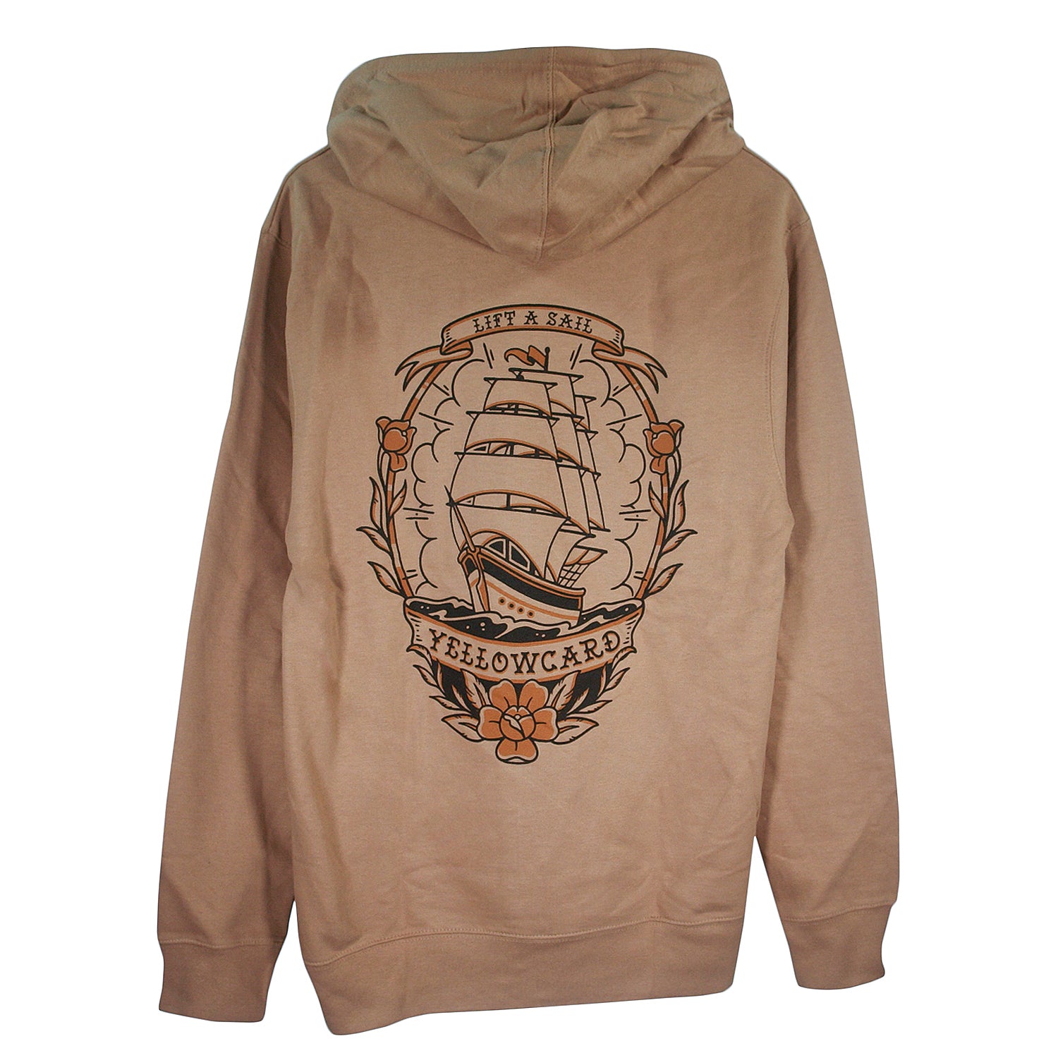 The Tattoo Ship - Sandstone Pullover is a tan hoodie with a large traditional sailing ship graphic, floral accents, and banners reading “LIFT A SAIL” and “YELLOWCARD.”.