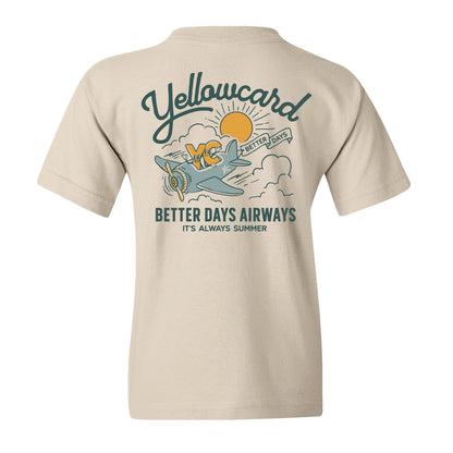 The Better Days Airlines - Natural Youth T-Shirt features Yellowcard text, an airplane with clouds and sun, and banners reading "Better Days" and "Better Days Airways It's Always Summer" on the back. Made from 100% cotton.